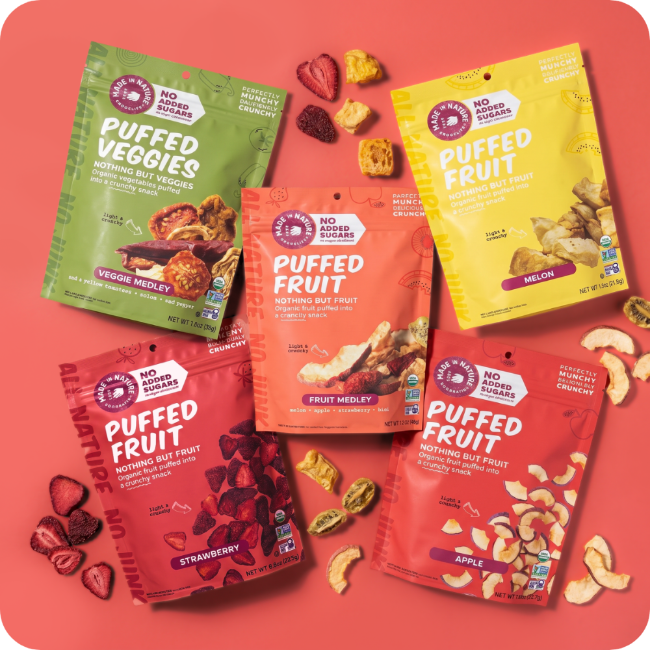 Five packages of puffed snacks in different flavors on a red background